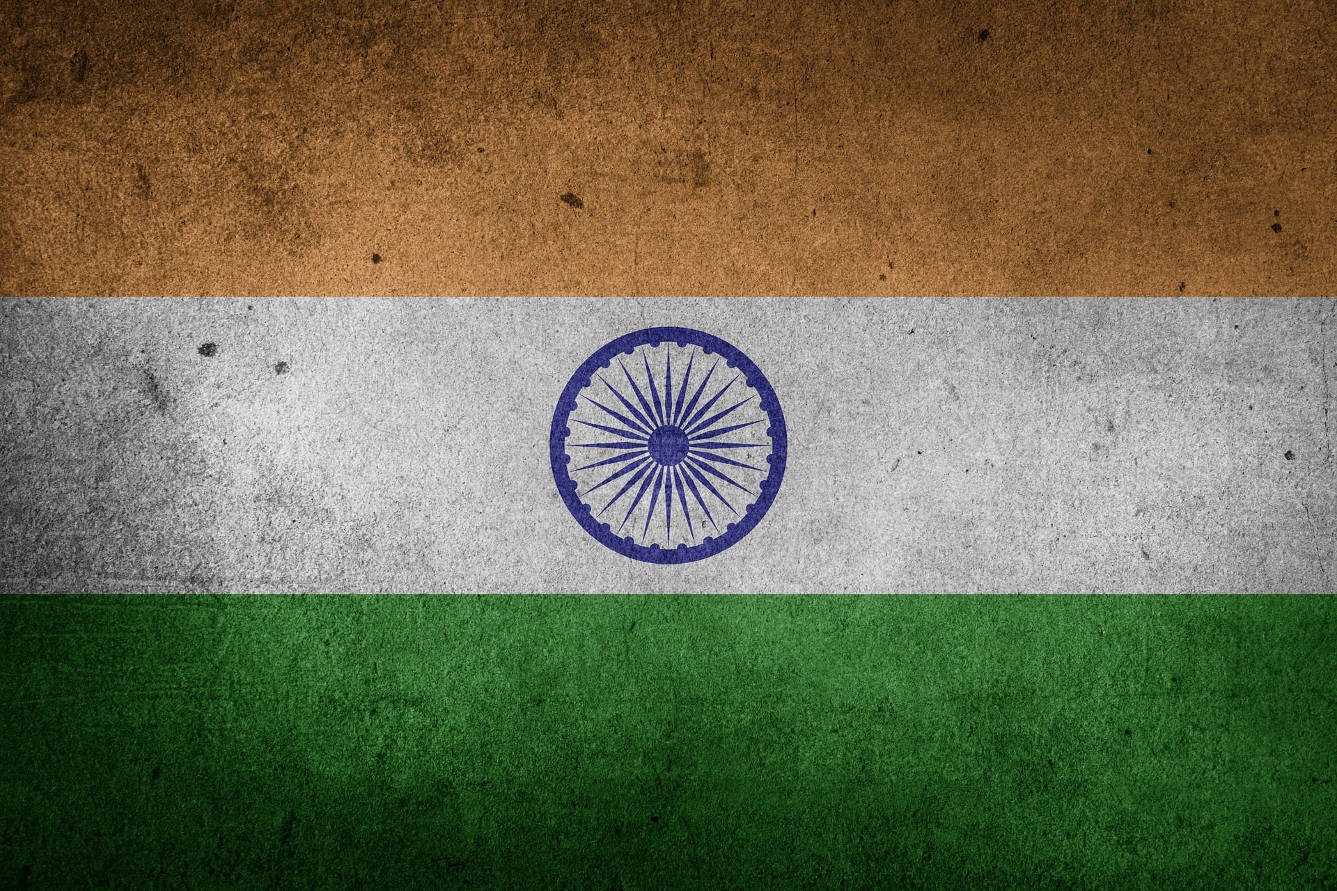The flag of India: saffron, white and green stripes with a blue Ashoka Chakra wheel